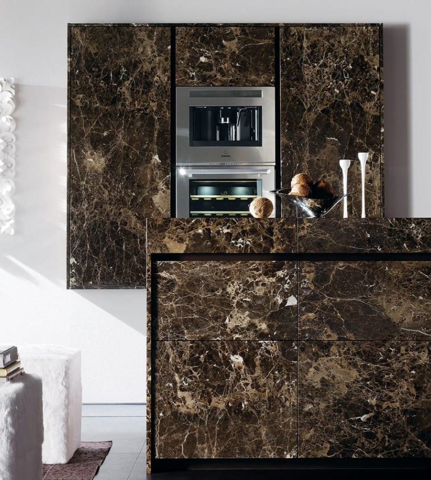 Modern kitchen design with sleek Dark Emperador marble cabinetry and countertop – sophisticated natural stone finish by Natural Stone Spain.