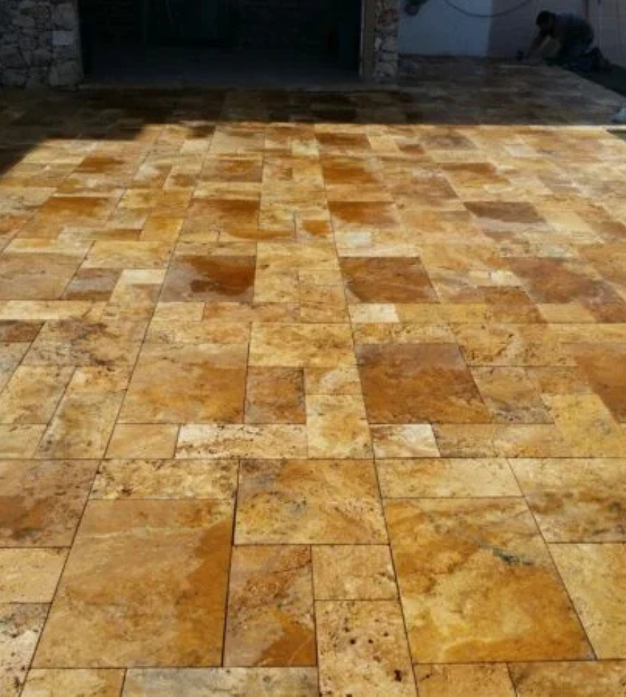 Outdoor flooring with rich-patterned Gold Travertine pavers – durable and vibrant natural stone by Natural Stone Spain.